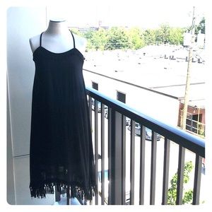 Flowing dress with fringed hem
